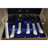 Boxed knives and forks.