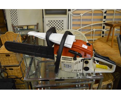A petrol chainsaw.