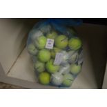 A quantity of golf balls.