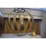 A large stylish metal ceiling light.
