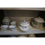A Continental part dinner service decorated with roses.
