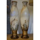 A pair of pottery vases.