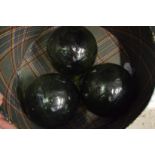 Three green glass fisherman's floats.