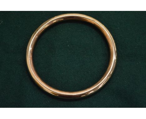 A 9ct gold hollow bangle, approx 12grams.