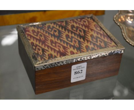 A silver mounted box and cover.