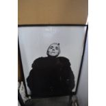 A large framed and glazed poster.