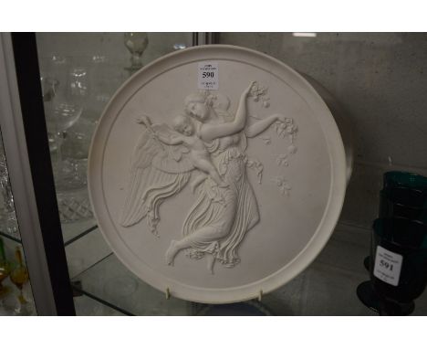 A pair of large Royal Copenhagen bisque porcelain circular moulded classical style plaques.