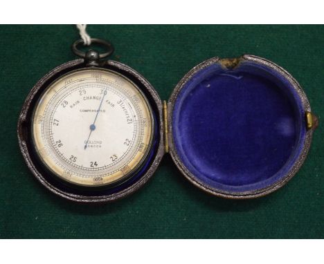 A leather cased pocket barometer by Dollond of London.