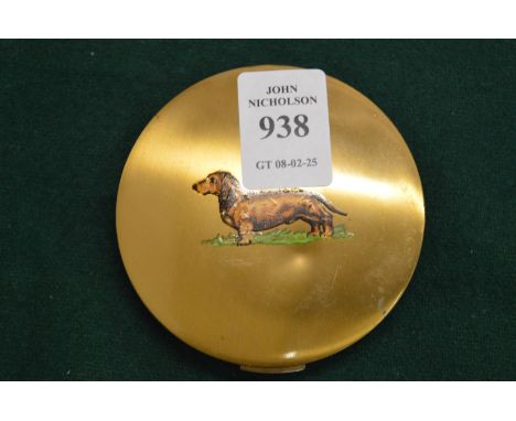 Ladies compact, the cover decorated with a dachshund.