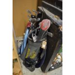 Two golf bags and contents.