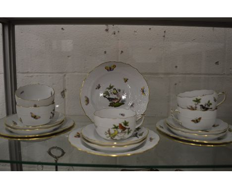 Herend Rothschilds Bird pattern part tea service comprising six tea plates, six saucers and five cups, all painted with birds