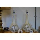 A pair of pottery table lamps.