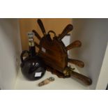 A knife set with carving knife and fork contained in a carved wood stand together with an amber