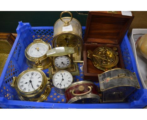 Various small clocks and a cased decorative compass.