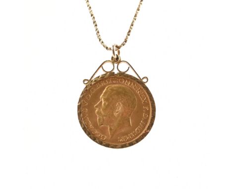 A 1912 sovereign coin in hallmarked 9ct yellow gold mount. The full sovereign coin having St. George on horseback slaying the