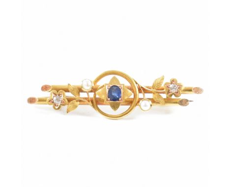 A 15ct gold sapphire pearl and diamond bar brooch. The brooch set with a central oval cut sapphire framed by pearl and diamon