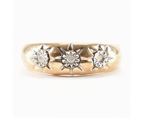 A hallmarked 9ct gold and diamond ring. The ring having illusion set diamonds to the head (one missing) to plain tapering ban
