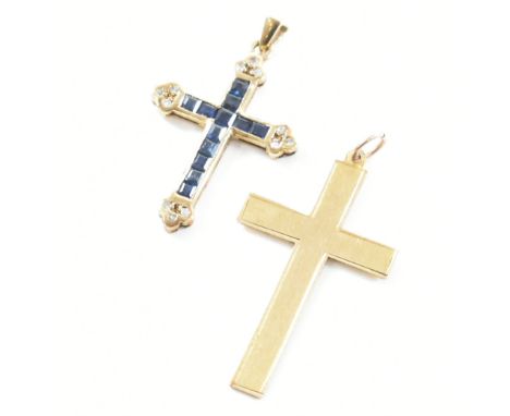Two vintage 9ct yellow gold cross necklace pendants. Both pendants depicting a Christian cross / crucifix, one set with squar