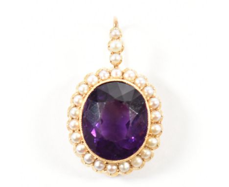 A 15ct gold amethyst and pearl pendant. The pendant set with an oval cut purple amethyst framed within a halo of pearls. The 