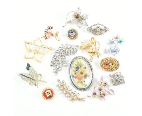 An assorted collection of vintage and later brooch pins. The lot to include gold and silver tone metal, white stones, simulat