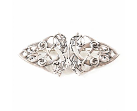 An Ola M Gorie Scottish hallmarked silver brooch pin. The brooch by Ola M Gorie depicting four entwined Finnish beasts having