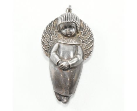 A vintage 835 silver angel necklace pendant. The pendant in the form of an angelic child with a pensive expression, hands cro