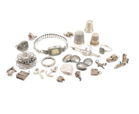 An assorted collection of silver and white metal jewellery. The lot to include three hallmarked etched thimbles, pair of hall