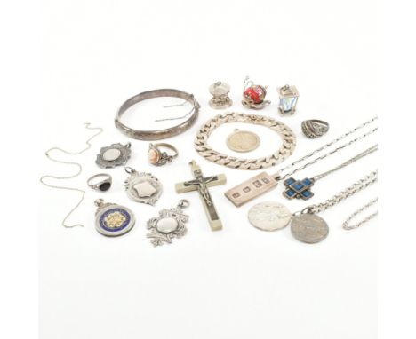 A collection of silver and white metal jewellery. The jewellery to include curb link bracelet, St Christopher pendants, chain