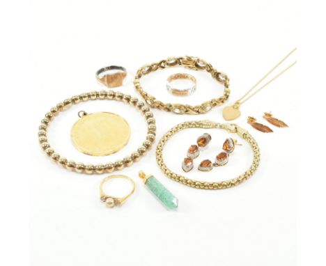 An assorted collection of yellow gold tone silver jewellery. The lot to include 9ct gold on sil, orange citrine, bangle, brac