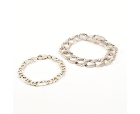 Two vintage 925 silver chain bracelets. The first comprised of fancy pierced and curb links united by a lobster claw clasp an