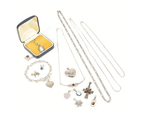 An assorted collection of silver jewellery. The lot to include diamond, pendants, necklace chains, garnet, marcasite, charms,