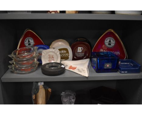 An assorted selection of 20th Century ceramic and glass breweriana, to include a pair of Carlton Ware Mackeson triform ashtra