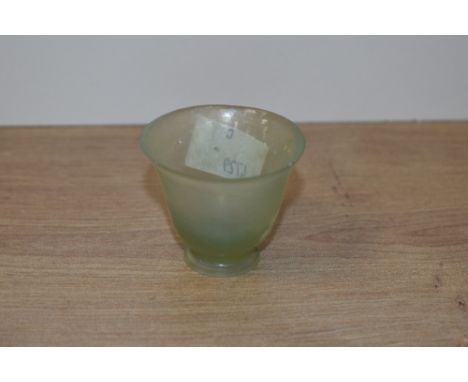 A Chinese jade sake cup, measuring 4.5cm high
Jade cup with some small imperfections to rim