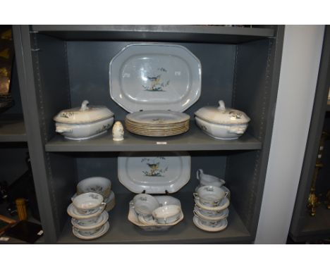 A selection of Spode 'Queen's Bird' patterned tableware, to include two ashettes, dinner plates, lidded tureens, and soup bow