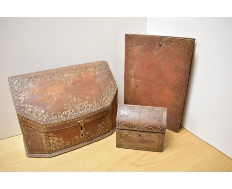 An attractive mid-20th Century brown tooled leather letter box, of Italian design and measuring 25cm x 33cm x 15cm, together 