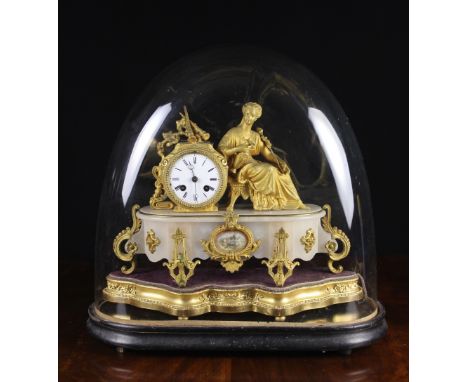 A 19th Century French Gilt Metal Figural Mantel Clock on an onyx marble base under a glass dome.  The movement striking a bel