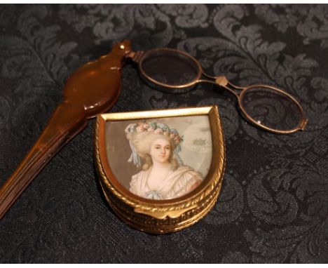 A Small Gilt Metal D-shaped Jewellery Box and a Pair of Spring Loaded Lorgnettes with gilt wire frames and an 'amber' coloure