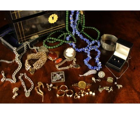 A Victorian Coromandel Jewellery Box & Contents. The box inlaid with brass stringing and having a recessed brass handle to th