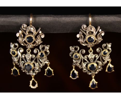 A Pair of Attractive Antique Gold & Silver Pendant Earrings set with diamonds and sapphires (one sapphire drop missing).