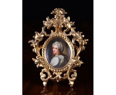 A Small Oval Berlin KPM Porcelain Portrait Plaque of Beatrice Cenci (1577-1599) depicting the young Roman noblewoman wearing 