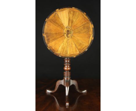 A 19th Century Miniature Inlaid Tilt-topped Tripod Table.  The circular top inlaid with a cornucopia of flowers in an oval pa