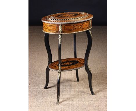 A Decorative Late 19th Century French Marquetry Jardiniere Table with gilt metal mounts. The oval top having a removable lid 