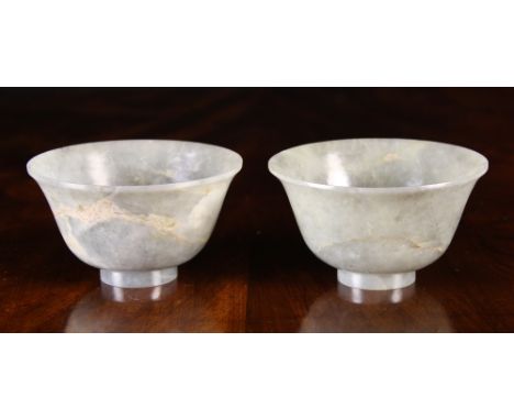 A Pair of Lavender & Grey Jade Bowls, 2½ ins (6 cms) high, 4¼ ins (11 cms) diameter.