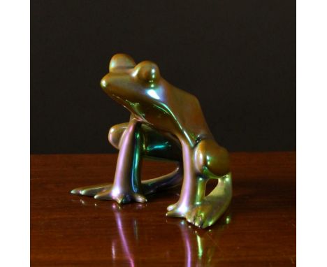 A Small Zsolnay Eosin Green & Purple Iridescent Glazed Figure of a frog, 3 ins (7.5 cms) in height.