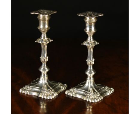 A Pair of Silver Candlesticks by Martin, Hall & Co (Richard Martin & Ebenezer Hall) hallmarked Sheffield 1908.  The candles s