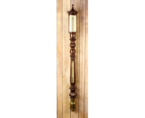 A Fine 19th Century Marine Barometer. The ivory scales signed I & A Walker Liverpool.  The reeded baluster column case with b