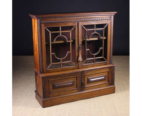 A Late 19th Century Dark Walnut Glazed Cabinet with ivorine label: 'Story & Triggs, 152 to 156 Queen Victoria St London EC'. 