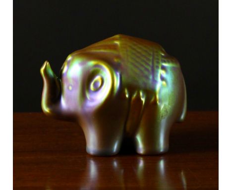 A Small Zsolnay Eosin Green & Purple Iridescent Glazed Figure of an elephant, 3 ins (8 cms) in height.