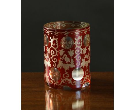 A Ruby Cut to Clear Glass Cylindrical Vase/Tumbler decorated with roundels between engraved scrollwork, storks, stags and a r