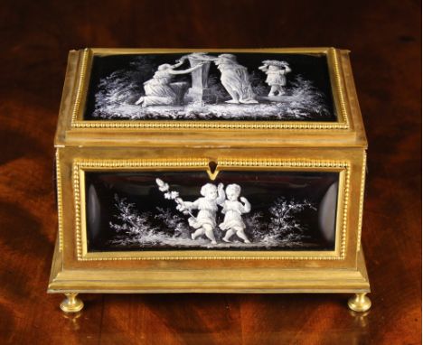 A Fine 19th Century Signed Limoges Enamel Jewellery Casket decorated in white on a black ground and composed of rectangular c